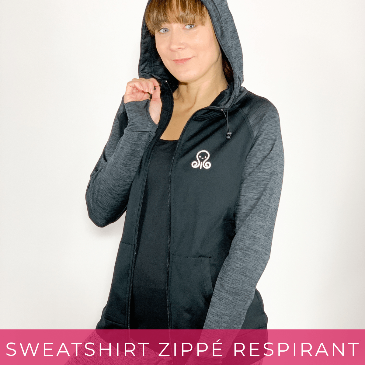 Femme en sweatshirt zippé respirant à capuche.